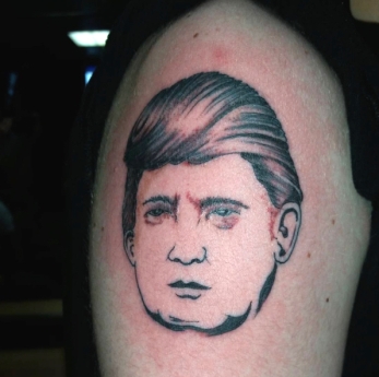 Trump portrait tattoo by Bob Holmes. [Photo: Instagram.com/bobstattoo]